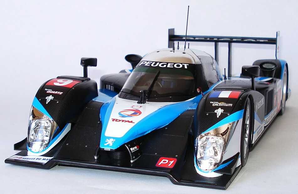 Foto 1:18 Peugeot 908 HDi FAP LeMans 2009 Total Nr.9, Gene / Wurz / Brabham (Sieger) Minichamps 150091209