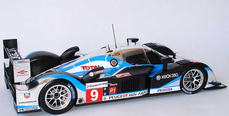 Foto 1:18 Peugeot 908 HDi FAP LeMans 2009 Total Nr.9, Gene / Wurz / Brabham (Sieger) Minichamps 150091209