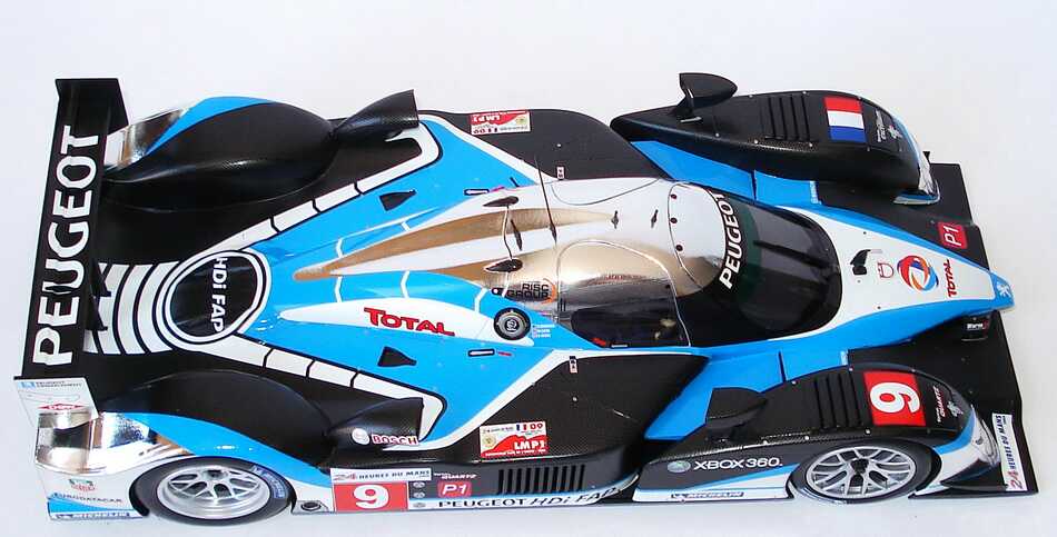 Foto 1:18 Peugeot 908 HDi FAP LeMans 2009 Total Nr.9, Gene / Wurz / Brabham (Sieger) Minichamps 150091209