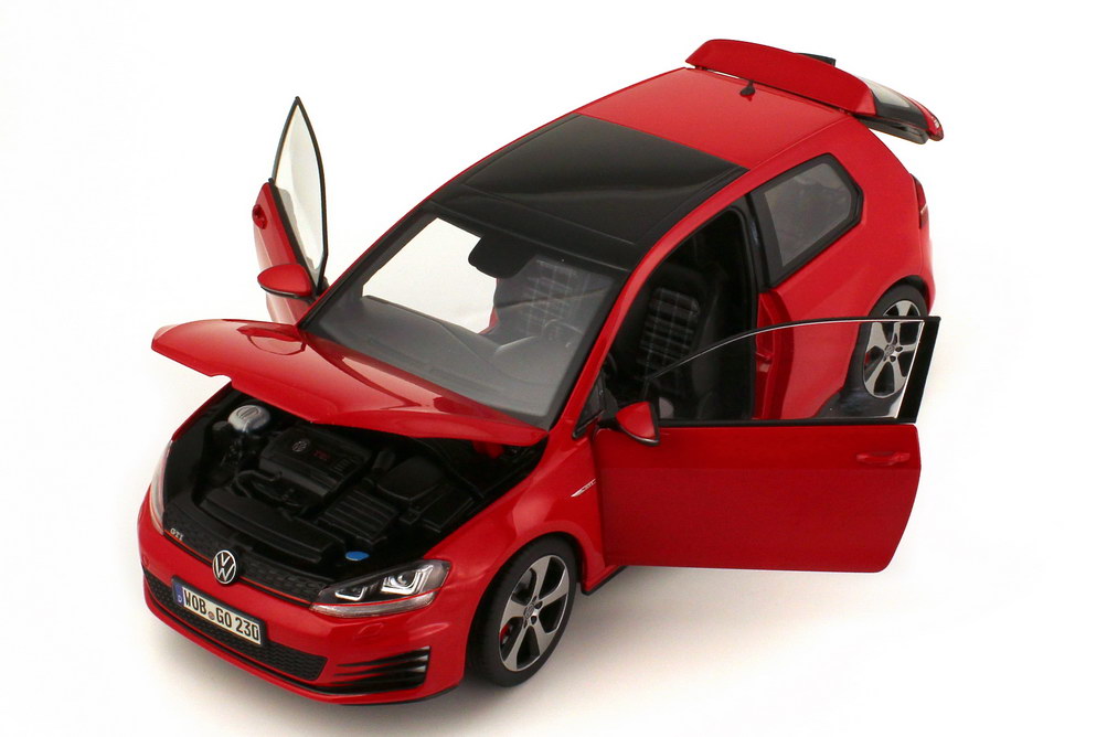 Foto 1:18 VW Golf VII GTI 2013 2türig tornado-rot Werbemodell Norev 5G3099302BFC