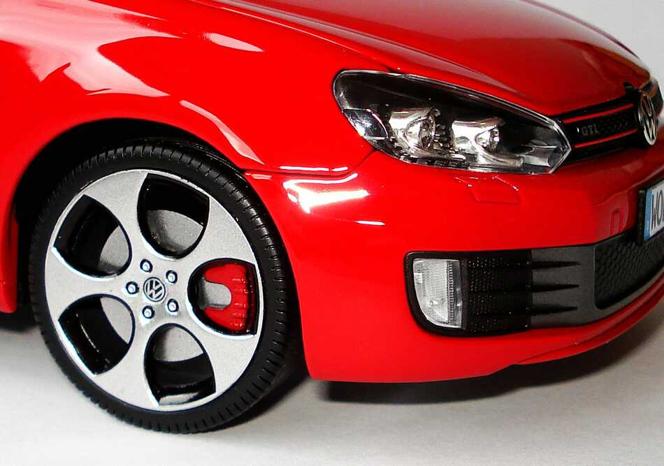 Foto 1:18 VW Golf VI GTI 3türig tornadorot Werbemodell Norev 5K3099302Y3D