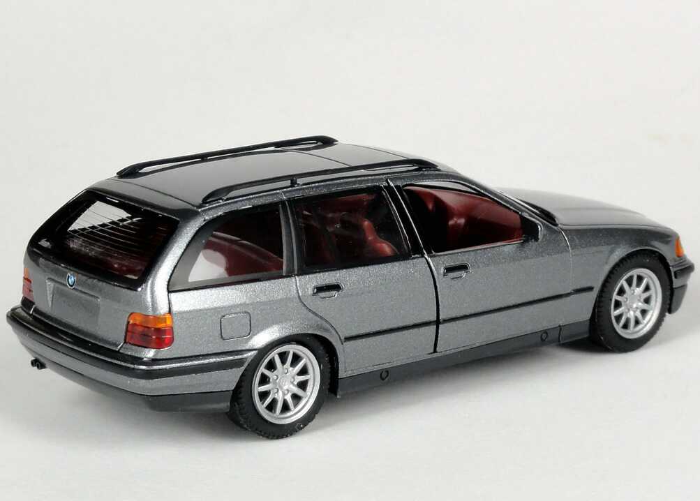 Foto 1:43 BMW 325i touring (E36) grau-met. Der neue BMW 3er touring Werbemodell Schuco 80429419973