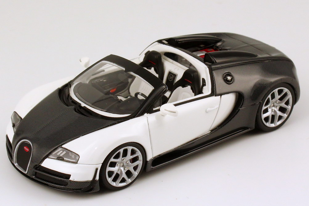 Foto 1:43 Bugatti Veyron 16.4 Grand Sport Vitesse carbon-schwarz/weiß Looksmart LS396C