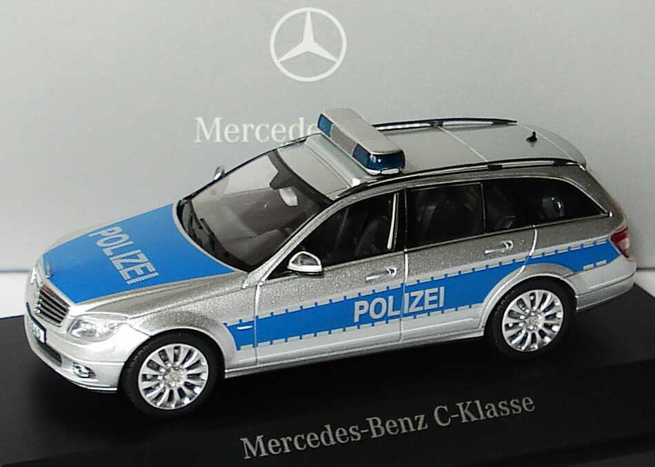 Foto 1:43 Mercedes-Benz C-Klasse T-Modell Elegance (S204) Polizei iridiumsilbermet./blau Werbemodell Schuco B66960329