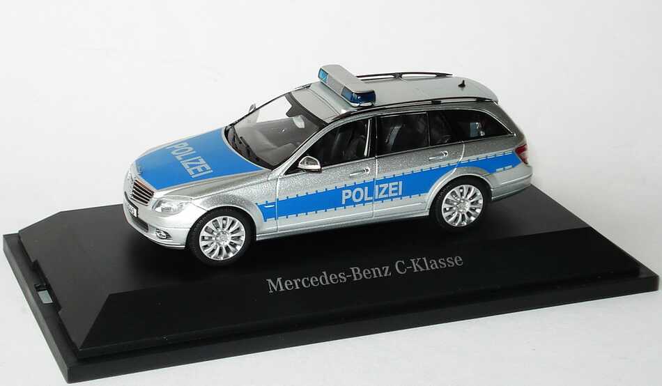 Foto 1:43 Mercedes-Benz C-Klasse T-Modell Elegance (S204) Polizei iridiumsilbermet./blau Werbemodell Schuco B66960329