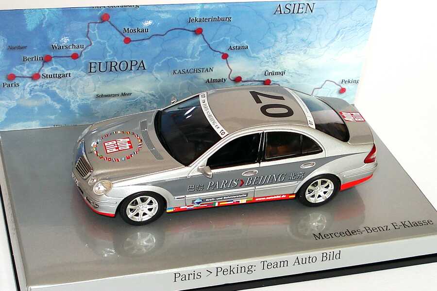 Foto 1:43 Mercedes-Benz E-Klasse Facelift (W211) Rallye Paris-Peking Team Auto Bild Nr.07 Werbemodell Minichamps B66962263