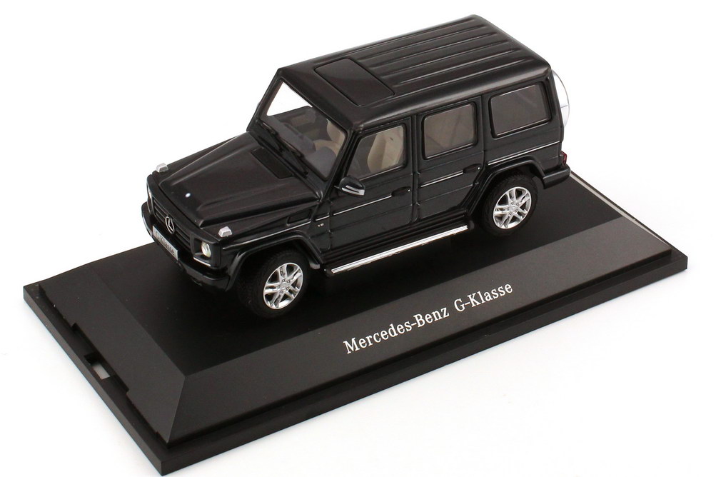 Foto 1:43 Mercedes-Benz G 500 (W463, MOPF 2012) magnetit-schwarz-met. Werbemodell AUTOart B66960140
