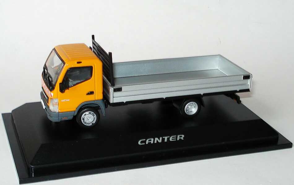 Foto 1:43 Mitsubishi Fuso Canter 2006 2a Pritsche-LKW orange/silber Kommunal Werbemodell Mitsubishi