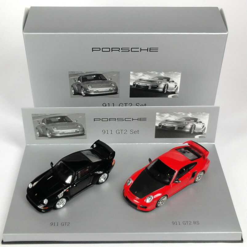 Foto 1:43 Porsche 911 GT2 Set (911 GT2 1995 schwarz + 911 GT2 RS 2010 indischrot) Werbemodell Minichamps WAP020SET27