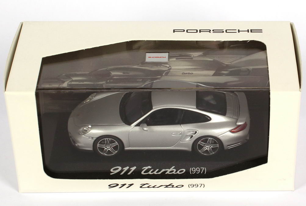 Foto 1:43 Porsche 911 turbo (997) silber-met., blaue IA Werbemodell Minichamps WAP02013216