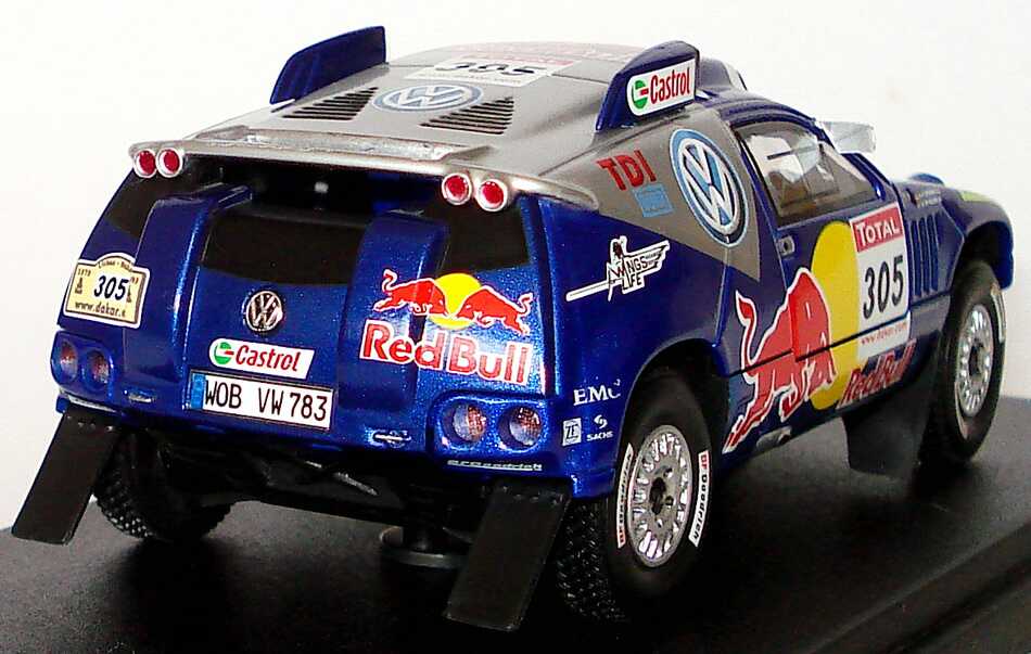 Foto 1:43 VW Race Touareg 2 Rallye Dakar 2009 Red Bull Nr.305, de Villiers / von Zitzewitz  Werbemodell Norev 7L609930098P