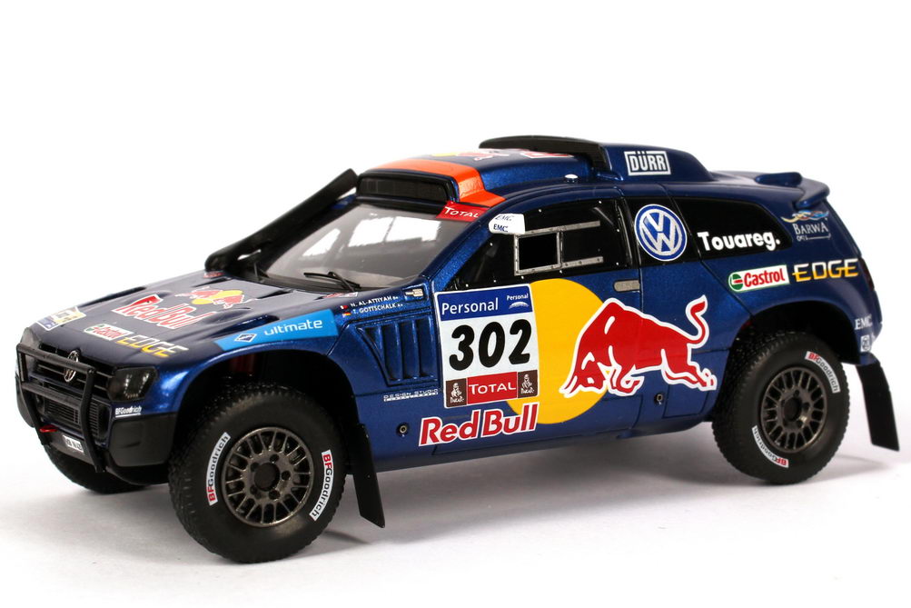 Foto 1:43 VW Race Touareg 3 Rallye Dakar 2011 Red Bull Nr.302, Al-Attiyah / Gottschalk  Werbemodell Spark 7L6099300B98P