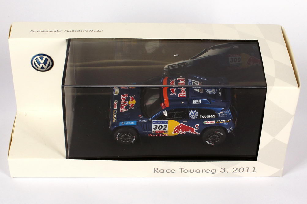 Foto 1:43 VW Race Touareg 3 Rallye Dakar 2011 Red Bull Nr.302, Al-Attiyah / Gottschalk  Werbemodell Spark 7L6099300B98P