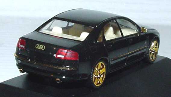 Foto 1:87 Audi A8 Mod. 2003 schwarz/gold 1. Advent 2003 herpa 149495