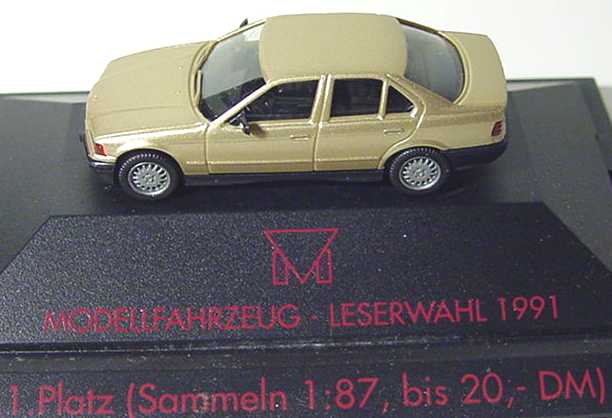 Foto 1:87 BMW 325i (E36) gold-met. 1. Platz Modellfahrzeug Leserwahl 1991 herpa