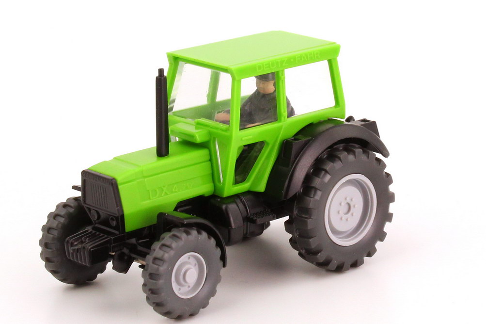 Foto 1:87 Deutz-Fahr Schlepper DX 4.70 grün, mit Fahrerfigur Wiking 386