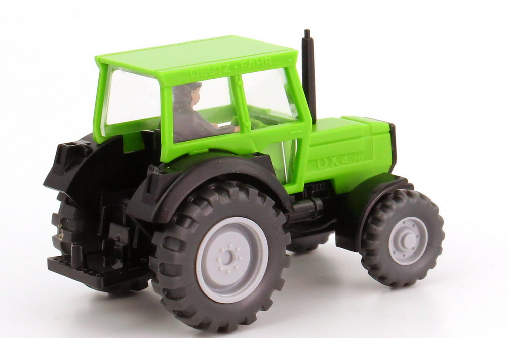 Foto 1:87 Deutz-Fahr Schlepper DX 4.70 grün, mit Fahrerfigur Wiking 386