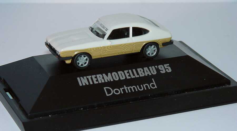 Foto 1:87 Ford Capri Mk III 3.0 Ghia beigeweiß mit seitl. Holzdekor Intermodellbau ´95 Dortmund herpa