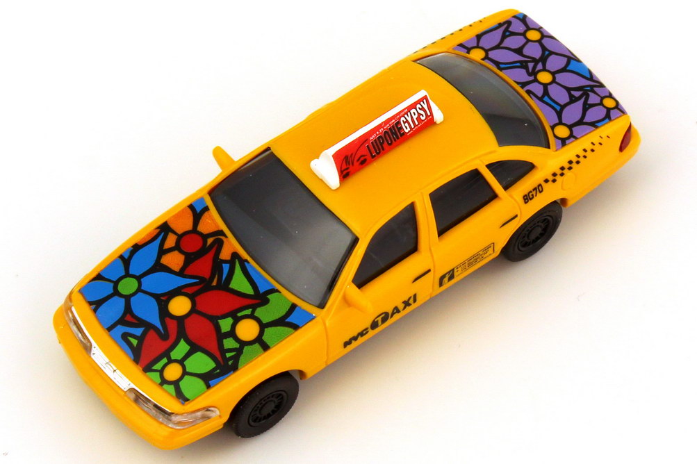 Foto 1:87 Ford Crown Victoria 1996 NYC Taxi Flower Power Busch 49030