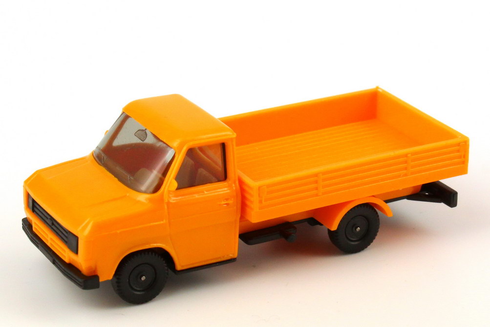 Foto 1:87 Ford Transit MK2 Pritsche/Plane gelborange/grau herpa 4023