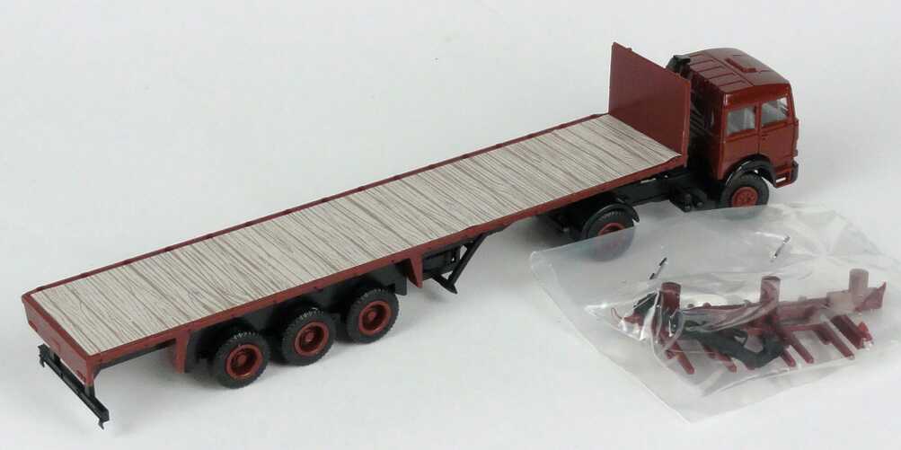 Foto 1:87 Iveco Magirus Deutz TurboTech Rungenpritsche-Szg weinrot (lenkbare Vorderachse) herpa 808276