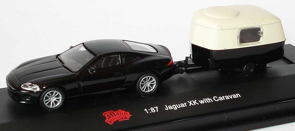 Foto 1:87 Jaguar XK Coupé schwarz mit Wohnwagen Malibu International 06000