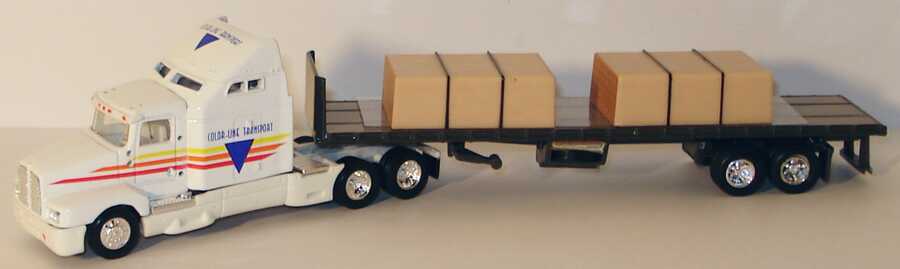 Foto 1:87 Kenworth T600B Sleeper lang FlachbettSzg 3/2 mit Ladung Color-Line Transport Ertl 4265