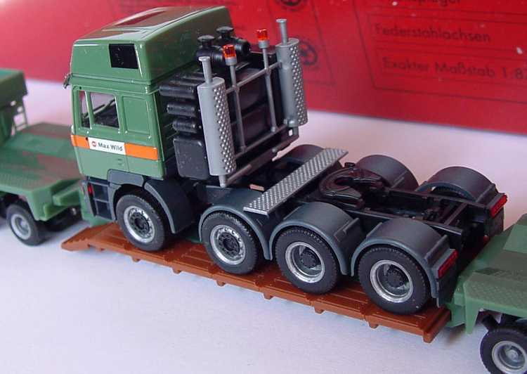Foto 1:87 MAN F2000 Evo Hochdach TiefladeSzg 4/5 Max Wild herpa 147460