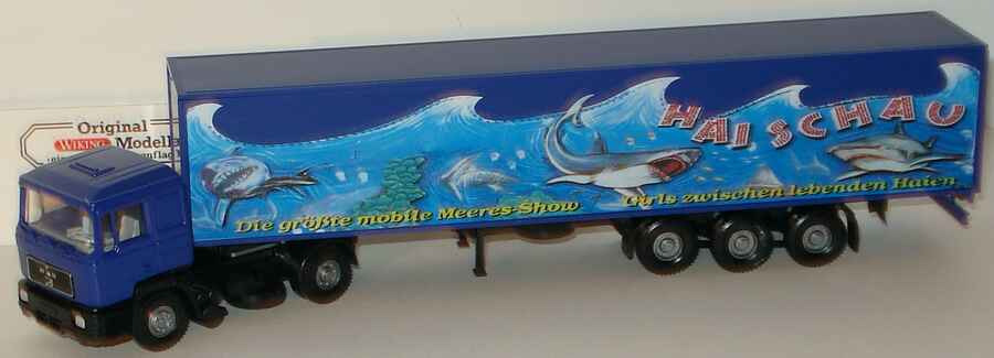 Foto 1:87 MAN F90 KoSzg 2/3 Haischau - Die größte mobile Meeres-Show - Girls zwischen lebenden Haien Wiking 1024(Faller-Modell)