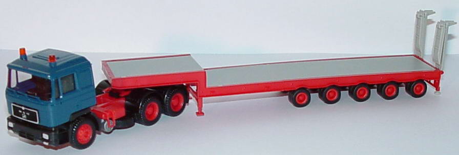 Foto 1:87 MAN F90 TiefladeSzg 3/5 dunkelblau/rot herpa 140676