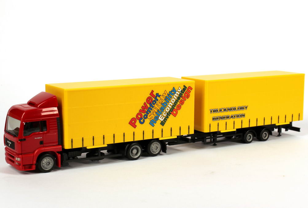 Foto 1:87 MAN TG-A LX (TG 460 A) JuGPTanHgz 3/2 Trucknology Generation Design IAA 2000 Werbemodell herpa 09.38069-0192