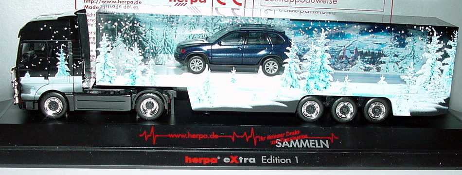 Foto 1:87 MAN TG-A XXL Fv Cv Diorama-KoSzg Cv 2/3 mit BMW X5 Herpa eXtra Edition 1 herpa 256810