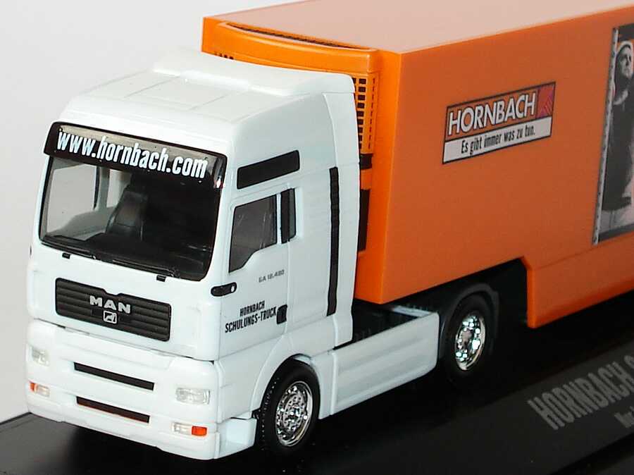 Foto 1:87 MAN TG-A XXL Fv Cv KükoSzg Cv 2/3 Hornbach Schulungs-Truck herpa 275033
