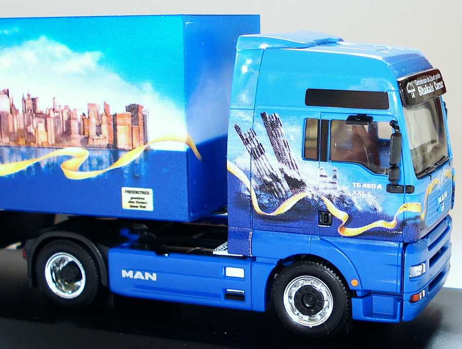 Foto 1:87 MAN TG-A XXL Fv Cv Safeliner KoSzg2/3 Friedenstruck Shakals Corner Werbemodell herpa 09.38069-0255
