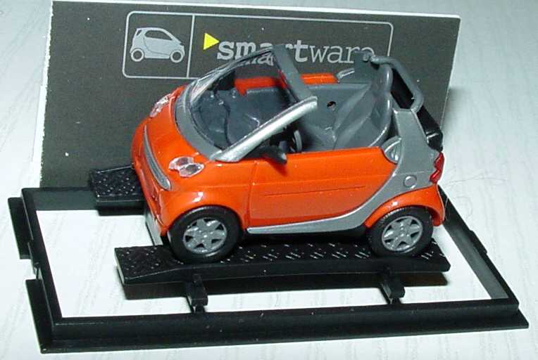 Foto 1:87 MCC Smart Cabrio dunkelorange/silber Werbemodell Busch 0013097V001000000