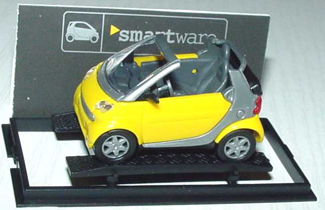 Foto 1:87 MCC Smart Cabrio gelb/silber Werbemodell Busch 0013097V001000000