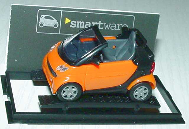 Foto 1:87 MCC Smart Cabrio orange/schwarz Werbemodell Busch 0013097V001000000