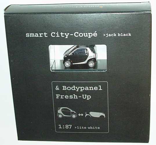 Foto 1:87 MCC Smart City-Coupé jack-black/silber-met. + Bodypanels in lite white Werbemodell Busch 0004832V000C08Q00