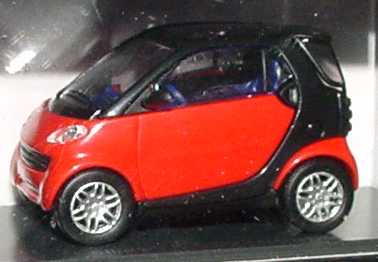 Foto 1:87 MCC Smart City-Coupé mad-red/schwarz + Bodypanels in hello-yellow Werbemodell Busch 0004832V000C07Q00