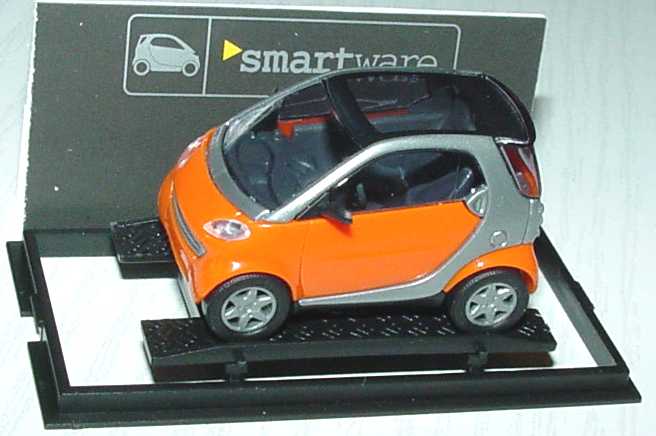 Foto 1:87 MCC Smart City-Coupé orange/silber Werbemodell Busch 0013097V001000000