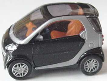 Foto 1:87 MCC Smart City-Coupé schwarz/silber-met. Busch 48900