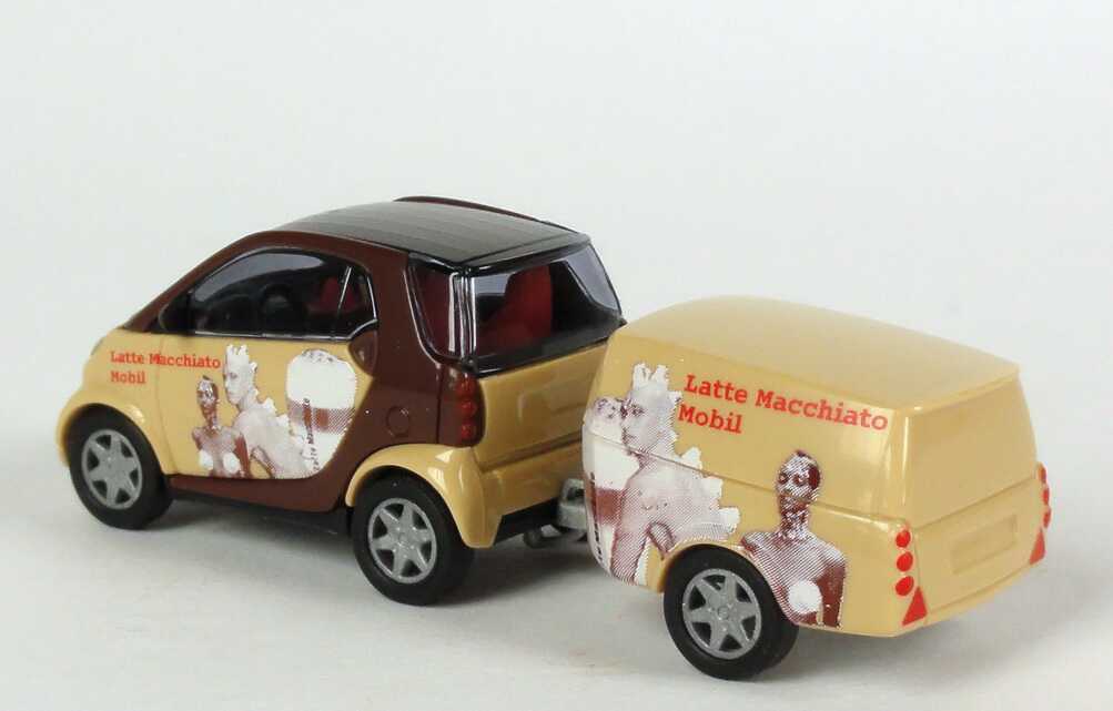 Foto 1:87 MCC Smart Fortwo mit Clevertrailer Latte Macchiato Mobil Busch 48946