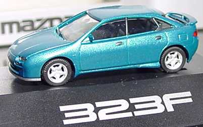 Foto 1:87 Mazda 323F lagunenblau-met. Werbemodell herpa