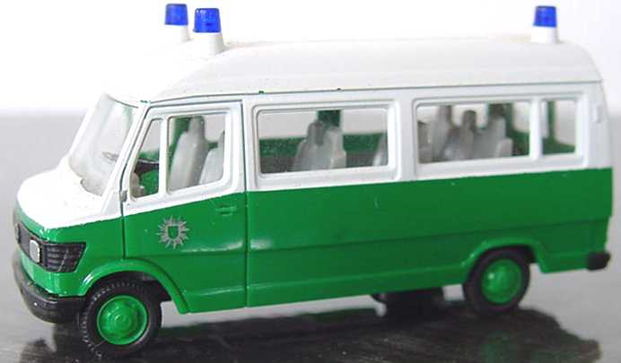 Foto 1:87 Mercedes-Benz 207D Bus Hochdach Polizei grün/weiß herpa