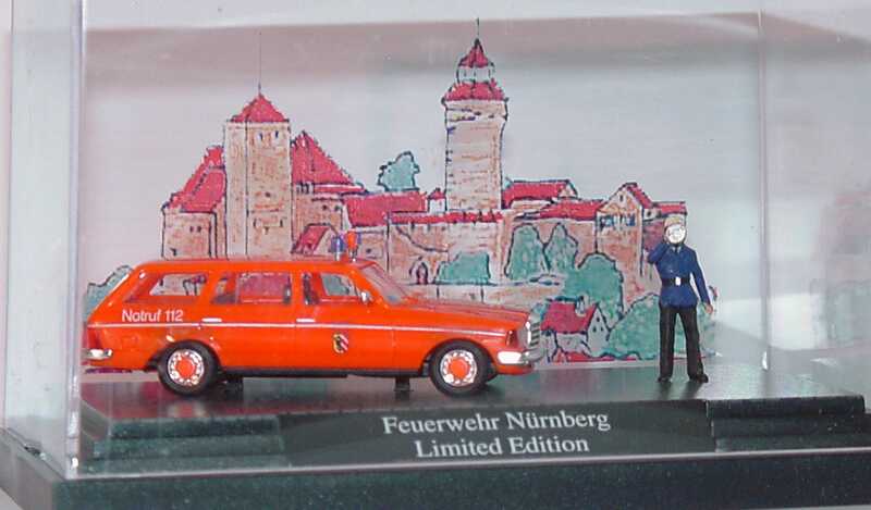 Foto 1:87 Mercedes-Benz 230TE (S123) Feuerwehr Nürnberg, 1/10/1 N tagesleuchtrot Busch 46804
