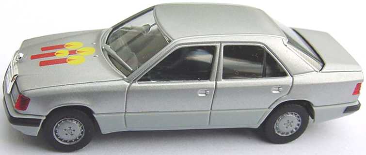 Foto 1:87 Mercedes-Benz 300E (W124) Facelift silber-met. 4. Advent mit Kerzenmotiv auf der Haube herpa