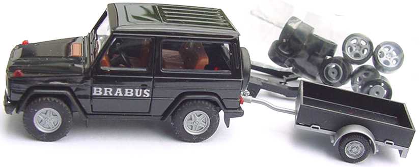 Foto 1:87 Mercedes-Benz 300GE schwarz Brabus mit Anhänger und Rädern herpa 022040