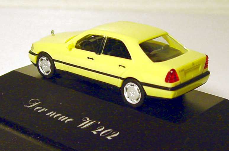 Foto 1:87 Mercedes-Benz C 220 (W202) gelb Der neue W 202 - 25 Jahre Autohaus Falter GmbH Werbemodell herpa