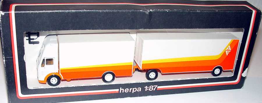 Foto 1:87 Mercedes-Benz (K) Topsleeper MöbeltransportHgz 2/2 AF Ackermann - Fruehauf herpa 906320