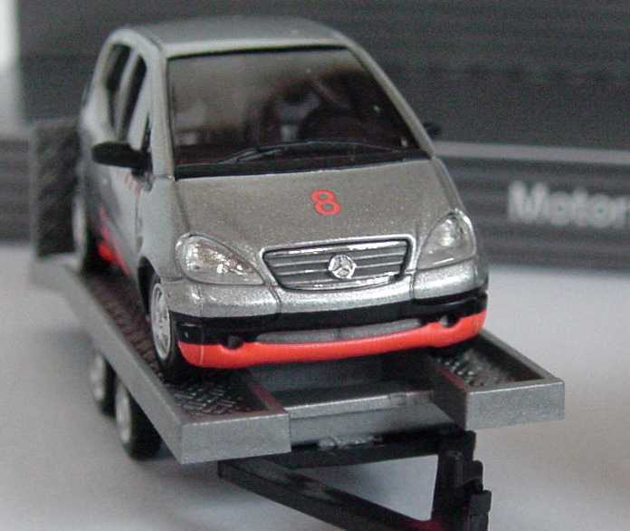 Foto 1:87 Mercedes-Benz Motorsport-Set (ML 320 mit Autotransportanhänger + A-Klasse Hakkinen) Werbemodell Busch B66005651